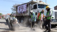 Eliminan baches en calles de Coacalco