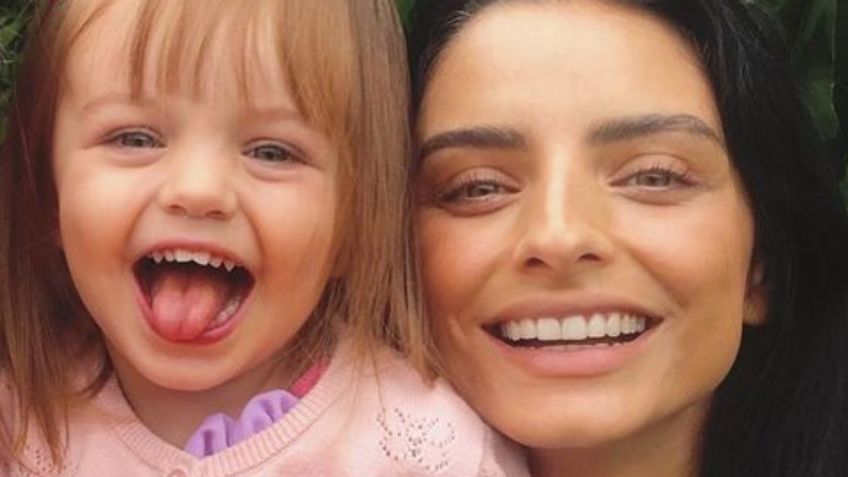 ¡Eso debió doler! Aislinn Derbez intenta huir de la prensa y su hija Kailani se golpea la cabeza: VIDEO