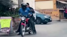 ¡Héroe! Repartidor LLEVA en su moto a policía para atrapar a ladrones: VIDEO