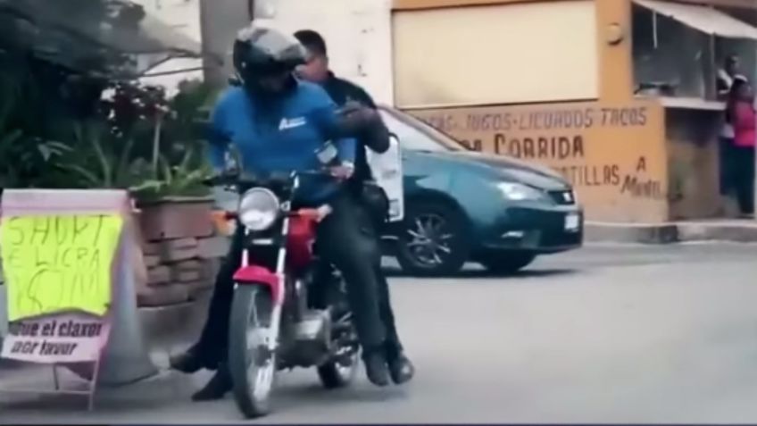 ¡Héroe! Repartidor LLEVA en su moto a policía para atrapar a ladrones: VIDEO