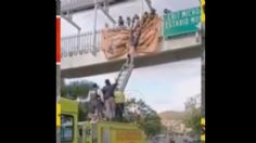 Morelia: Policías y bomberos rescatan a hombre que intentó aventarse de un puente | VIDEO