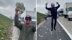 Lluvia de dólares enloquece a conductores en carretera de California; les piden devolverlos | VIDEO