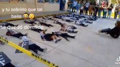 El sueño le gana a niño y se queda dormido en pleno bailable de Día de Muertos | VIDEO