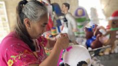 Familia conserva tradición de fabricar piñatas artesanales en Temoaya