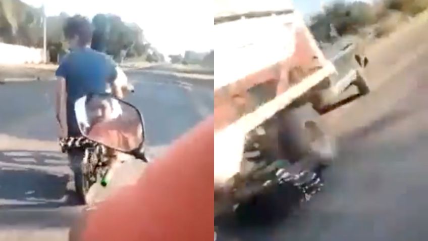 IMÁGENES FUERTES: Motociclista muere tras chocar contra camión; iba jugando "carreritas" | VIDEO