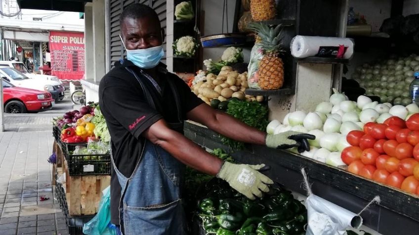 Migrantes haitianos encuentran oportunidad de trabajo en mercado de Tampico, Tamaulipas