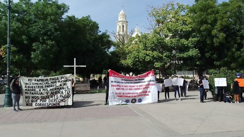 Viudas de policías asesinados piden indemnización