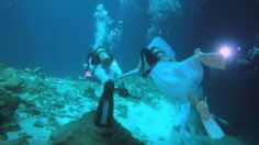 Pareja española se casa a 10 metros de profundidad en un cenote de Yucatán: VIDEO