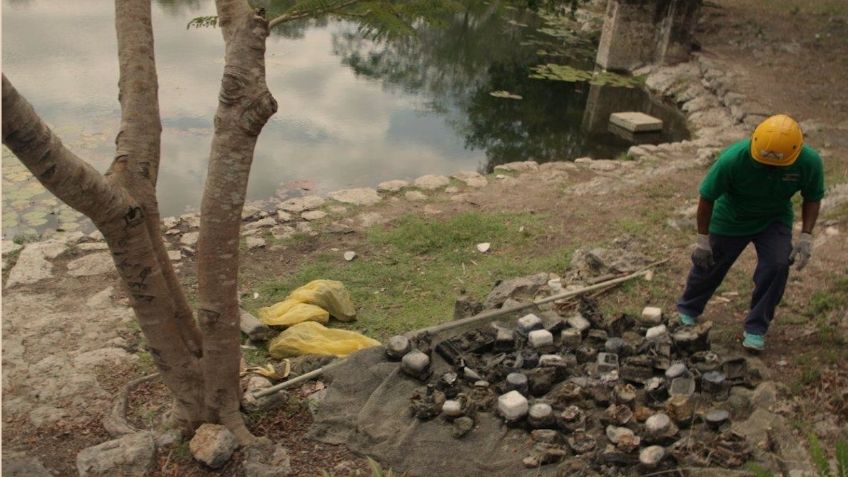 Luego de años de contaminación, extraen 95 medidores de luz en un cenote