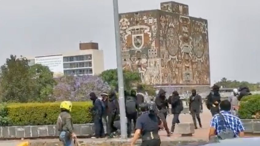 Encapuchados vandalizan Ciudad Universitaria y agreden a medios de comunicación: VIDEO