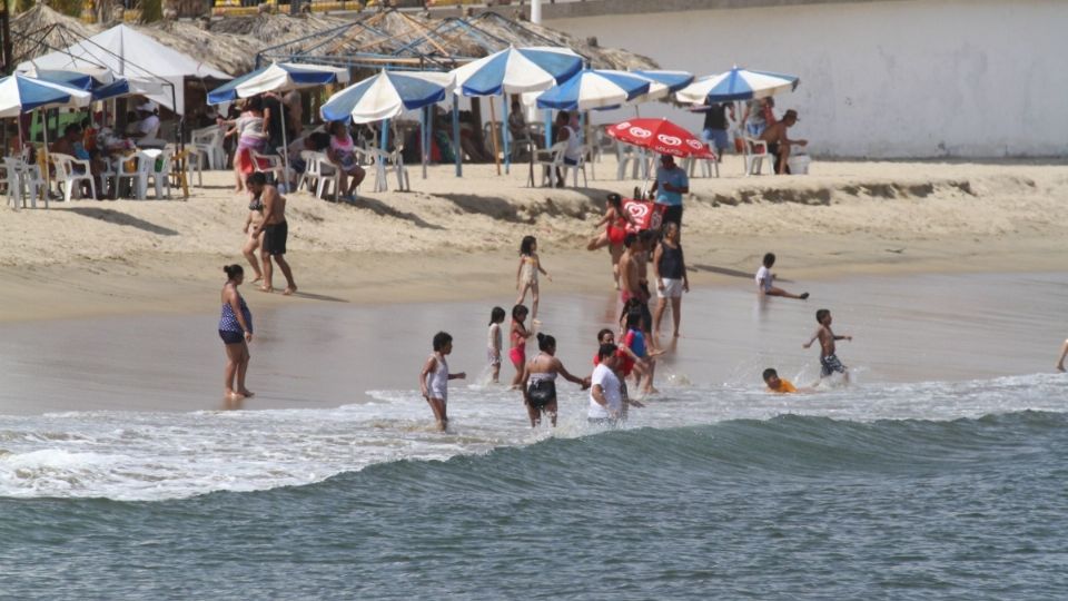 La celebración se realizó en un popular balneario de Rosario a la orilla del río Paraná. FOTO: Cuartoscuro