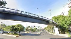 ¡Héroes sin capa! Ciudadano y policía evitan que mujer se suicide desde puente: VIDEO