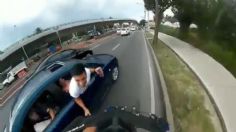 Hombre intenta presuntamente tirar a ciclista desde auto en movimiento: VIDEO VIRAL