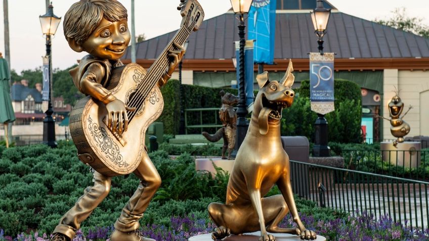 Miguel y Dante, de la cinta COCO, serán esculturas doradas en EPCOT de Disney World