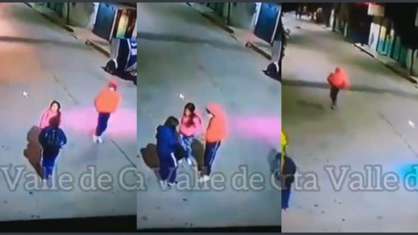 Edomex: Con pistola en mano, sujeto asalta a dos chicas en calles de Valle Chalco | VIDEO