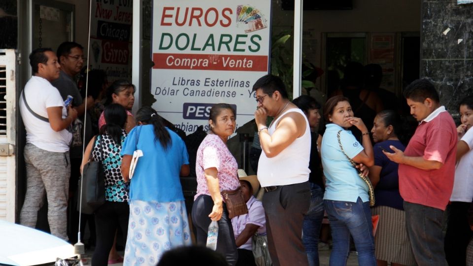 PANDEMIA. Migrantes apoyan a sus familiares. Foto: Enfoque