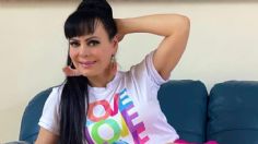 Maribel Guardia da cátedra de estilo con pantalón acampanado y top blanco