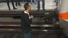 VIDEO | El tenso momento en que un hombre baja a las vías del Metro e intenta atentar contra su vida