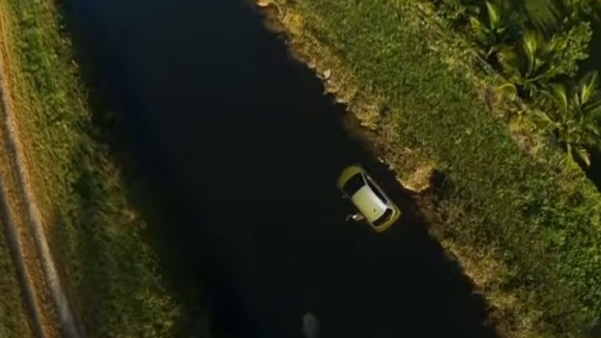 VIDEO | Dramático rescate: hombre en parapente salvó a una mujer de morir en un canal con caimanes