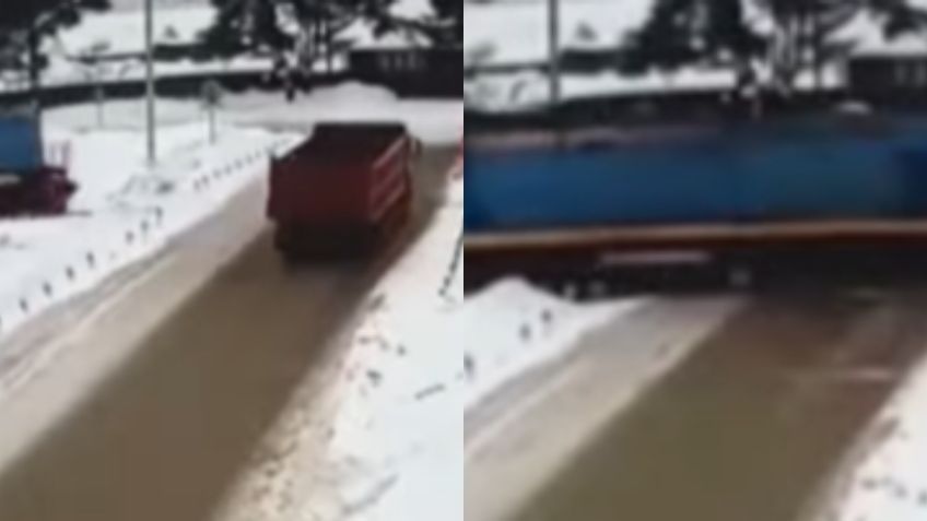 ¡De milagro! Perrito sobrevive a brutal impacto de tren con camión en Rusia | VIDEO