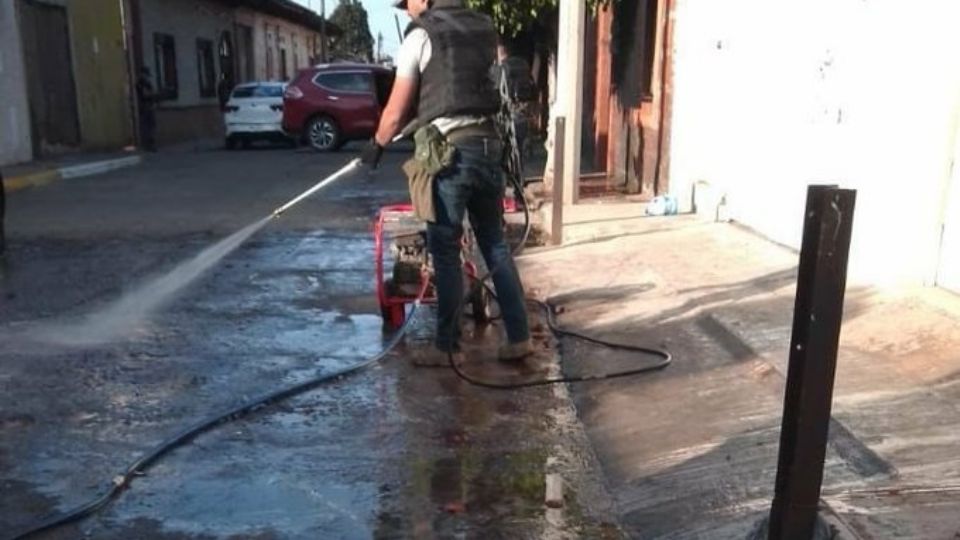 Los sicarios limpiaron la calle y recogieron los cuerpos