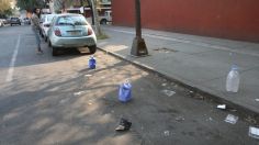 ¿Apartan lugares en tu colonia? Así puedes denunciar para que retiren sus botes en CDMX