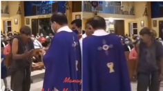 Captan a sacerdote negándose a dar la hostia a un mendigo y lo tunden en redes | VIDEO