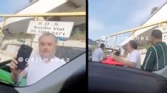 ¡Con todo y guaruras! Conductor de un auto de lujo agrede a otro automovilista | VIDEO