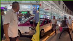 Taxista casi atropella a un perrito; se va a los golpes con el dueño | VIDEO