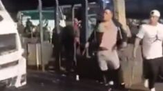 Con vidrios rotos y machete en mano: así fue el brutal enfrentamiento entre taxistas y microbuseros en Tacubaya | VIDEO