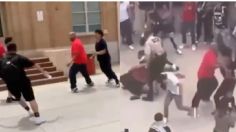 Padre golpea brutalmente a 30 estudiantes que le hacían bullying a sus hijos | VIDEO