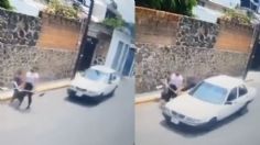 Taxista intenta "manosear" a mujer cuando camina por la calle y VIDEO indigna las redes