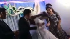 El indignante momento en que un hombre golpea en la cabeza a su esposa en plena boda | VIDEO