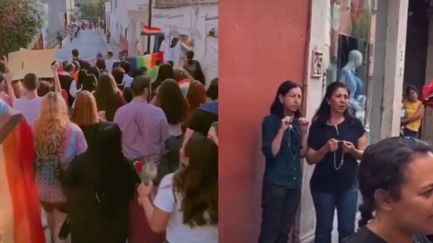 Señoras rezan el rosario cuando en medio de una marcha LGBTQ+ | VIDEO