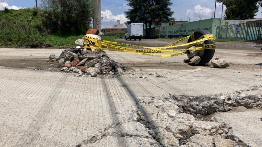 Camiones afectan colonias en Edomex; peso y vibración dañan pavimento, casas y tuberías subterráneas