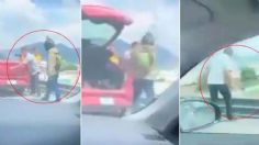 Fiscalía de Edomex investiga video del hombre que empuja a repartidor de un puente; desconocen el paradero de ambos