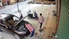 Escalofriante VIDEO muestra el momento en que un auto atropella y aplasta a un mecánico mientras trabajaba