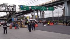 Personas con discapacidad bloquean accesos a la Terminal 1 del AICM y desquician el tráfico