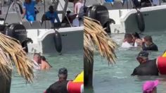 Graban a pareja mientras mantiene intimidad en una playa repleta de turistas