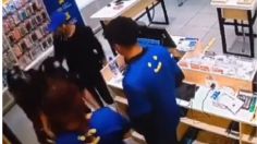 VIDEO: así fue el violento asalto a una tienda de celulares en Puebla, en segundos desarmaron a un policía