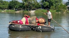 Amal, la muñeca gigante de casi tres metros, se despide de México en el Río Suchiate