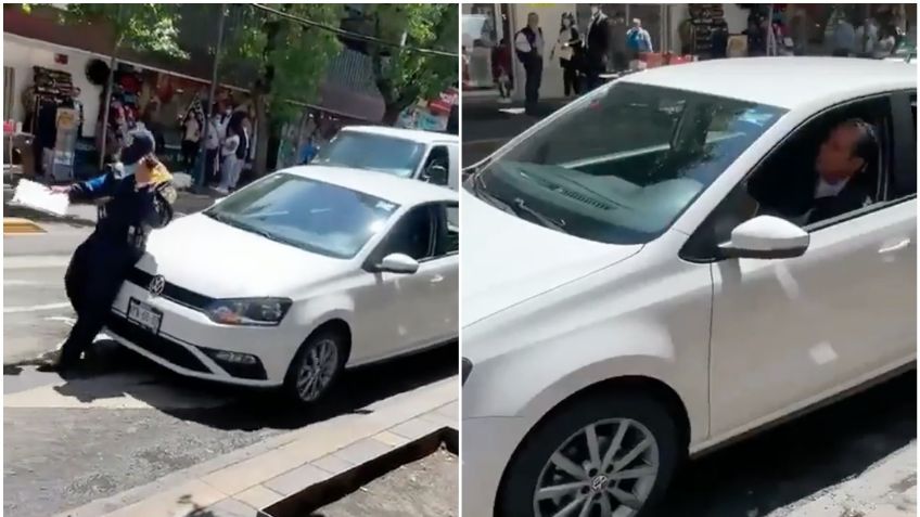 VIDEO: conductor gandalla avienta su auto a policía y se da a la fuga para no pagar infracción