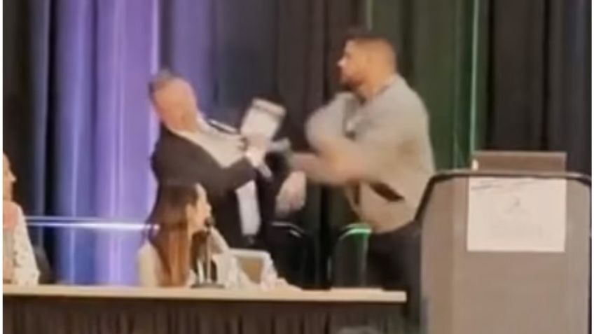 VIDEO: esposo furioso interrumpe una conferencia para defender a su pareja, el ponente la agredió sexualmente