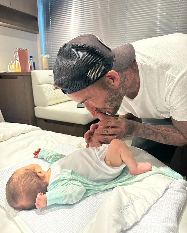 David Beckham y el hijo de Marc 