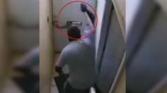 VIDEO: ratero intenta entrar a una casa y el dueño le tunde el brazo a palazos