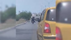 VIDEO: taxista toma venganza, persigue a ladrones en moto para arrollarlos