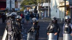 VIDEO: riña entre comerciantes termina en balacera en mercado de Toluca