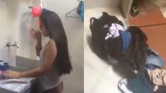 Niña reprueba el año y su padre la castiga con lavar a mano su ropa