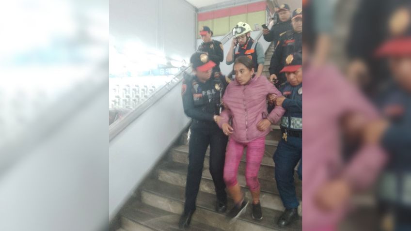 FOTOS | Mujer salta alambrado y cae a las vías del Metro