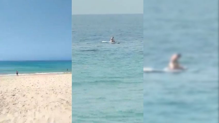 Contén la respiración antes de ver a esta pareja que olvida los peligros del mar al ser grabada teniendo relaciones en una playa